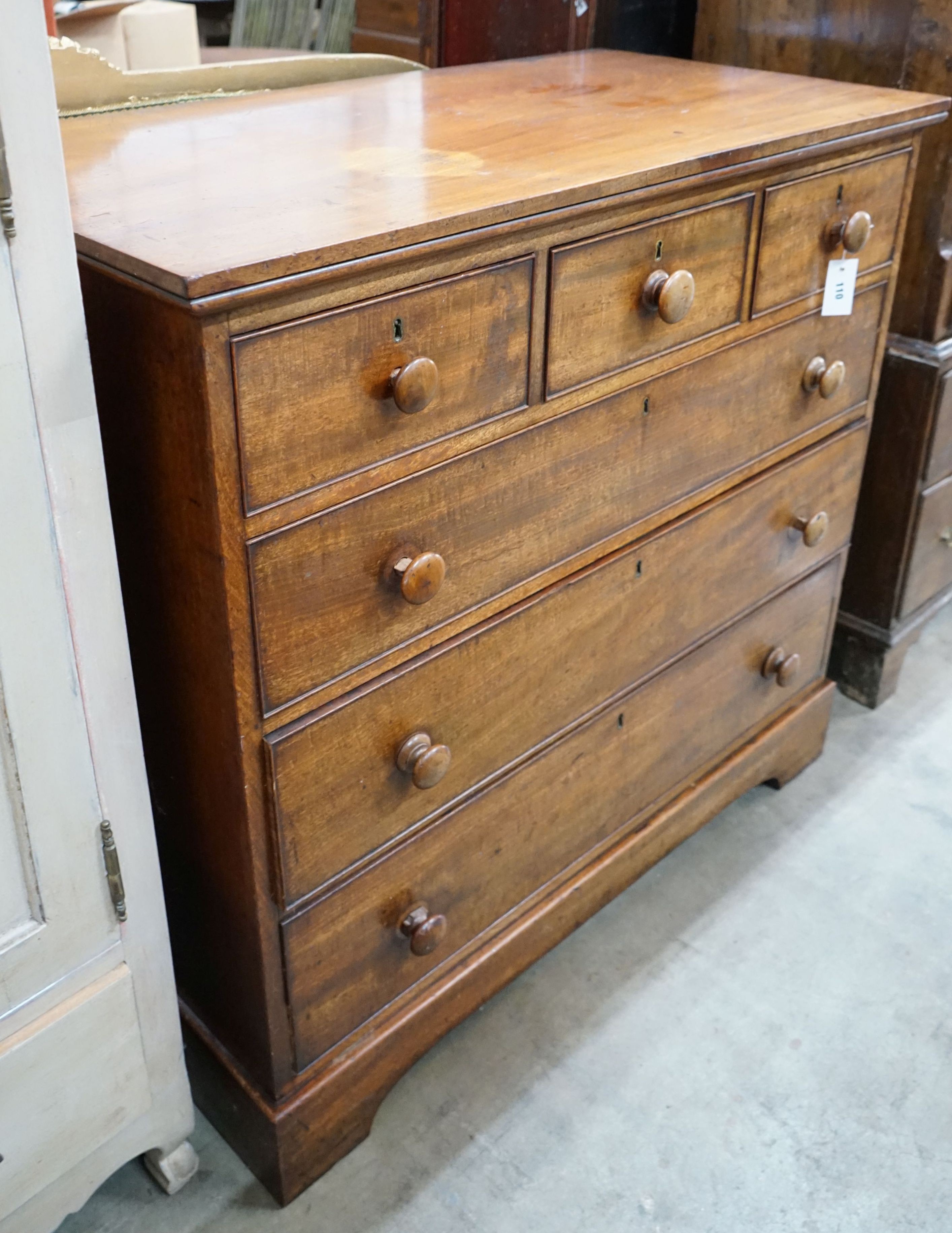 An early Victorian mahogany chest of three short and three long drawers, width 110cm, depth 58cm, height 105cm